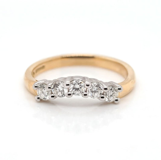 A yellow and white gold five stone brilliant cut diamond ring