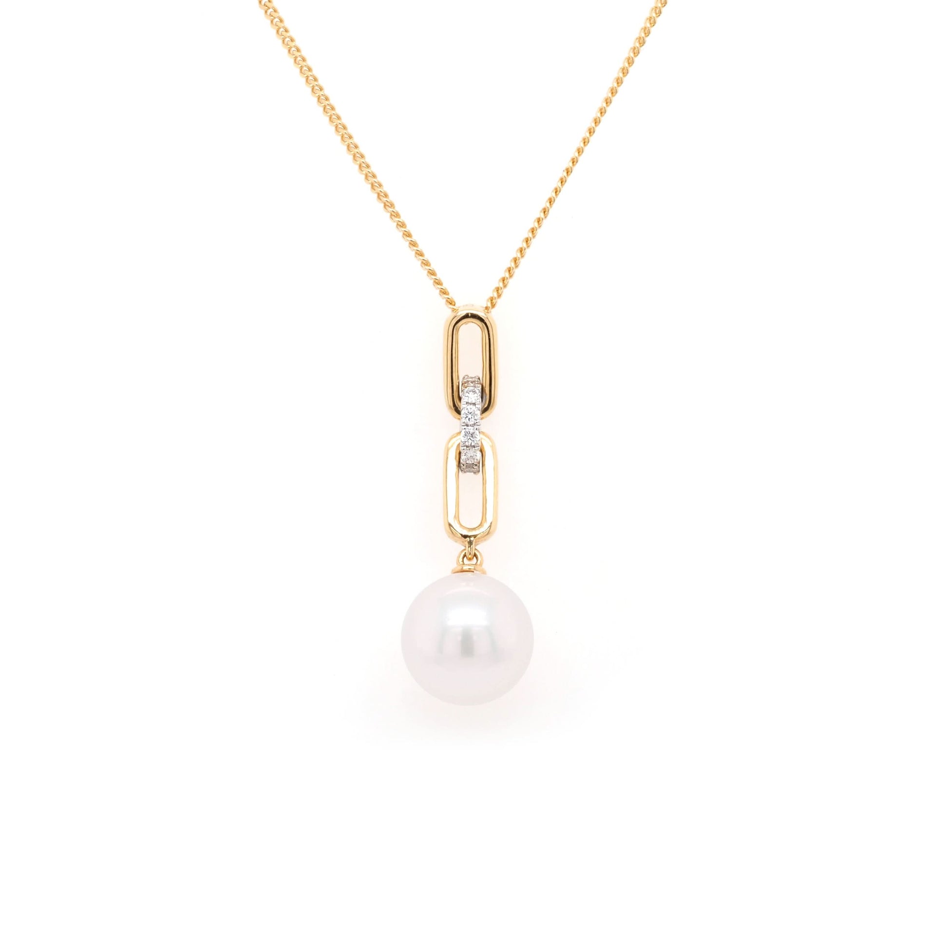 A yellow gold white pearl and diamond link drop pendant on a gold chain