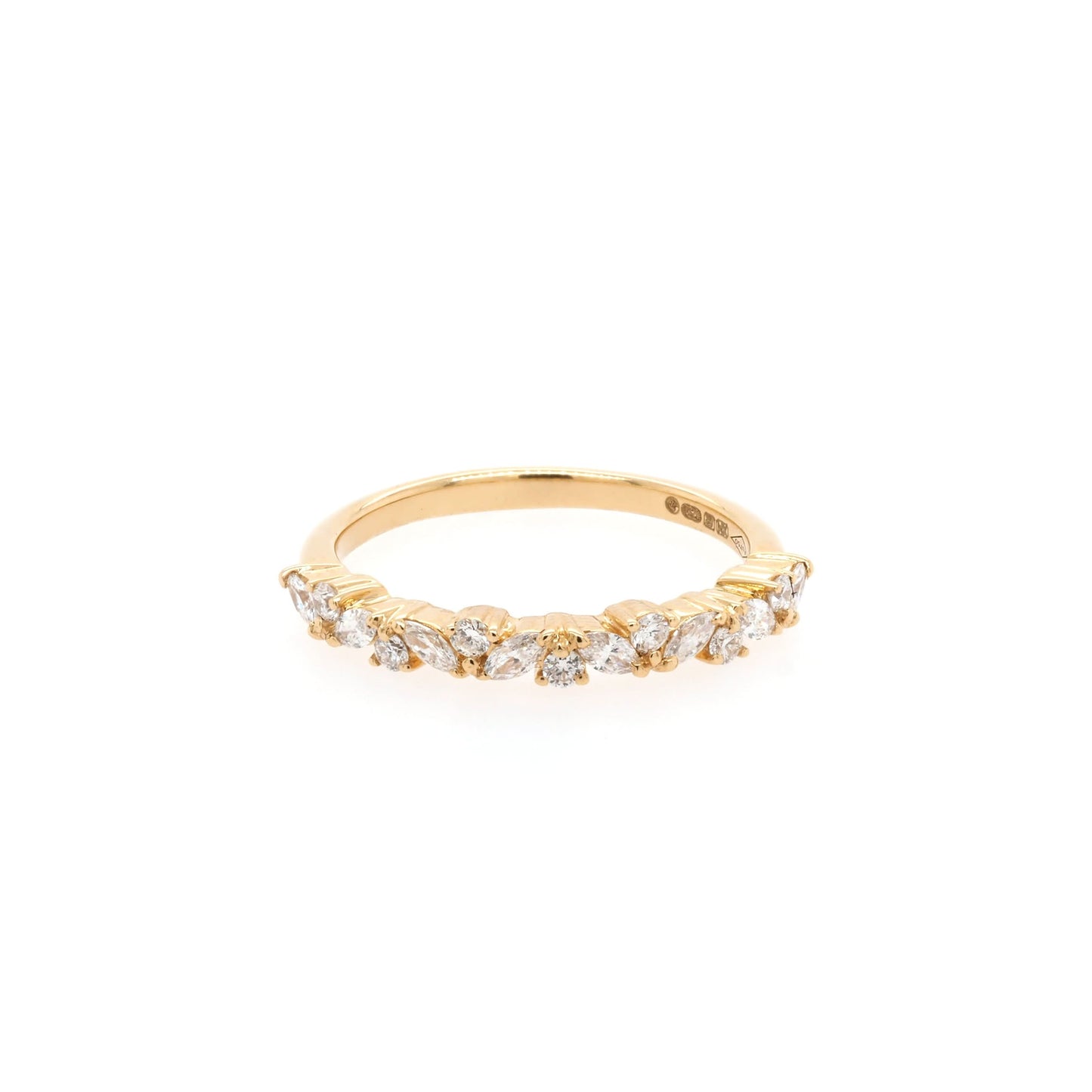 A yellow gold marquise and brilliant cut diamond half eternity band