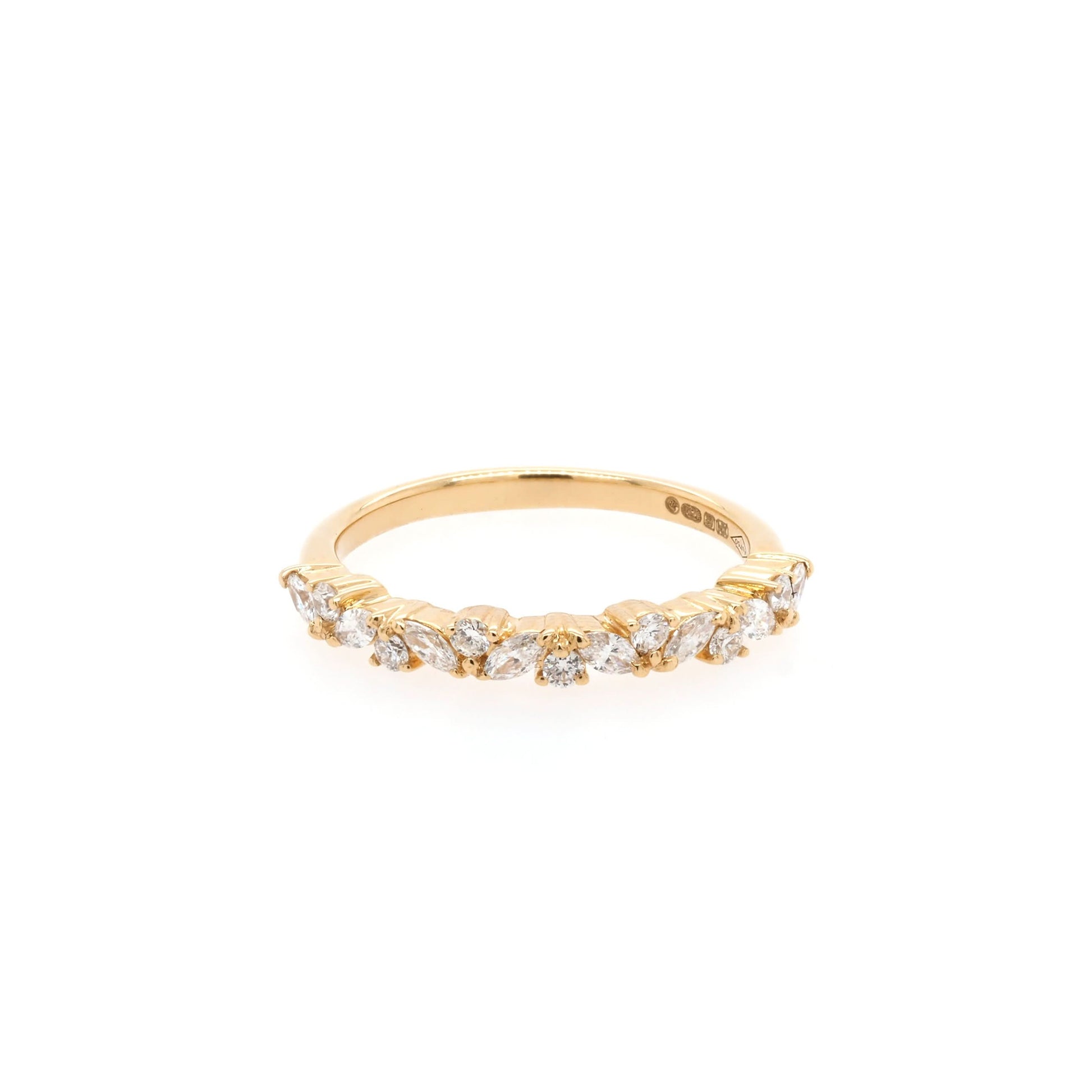 A yellow gold marquise and brilliant cut diamond half eternity band