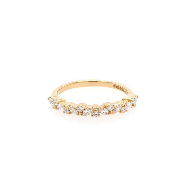 A yellow gold marquise and brilliant cut diamond half eternity band