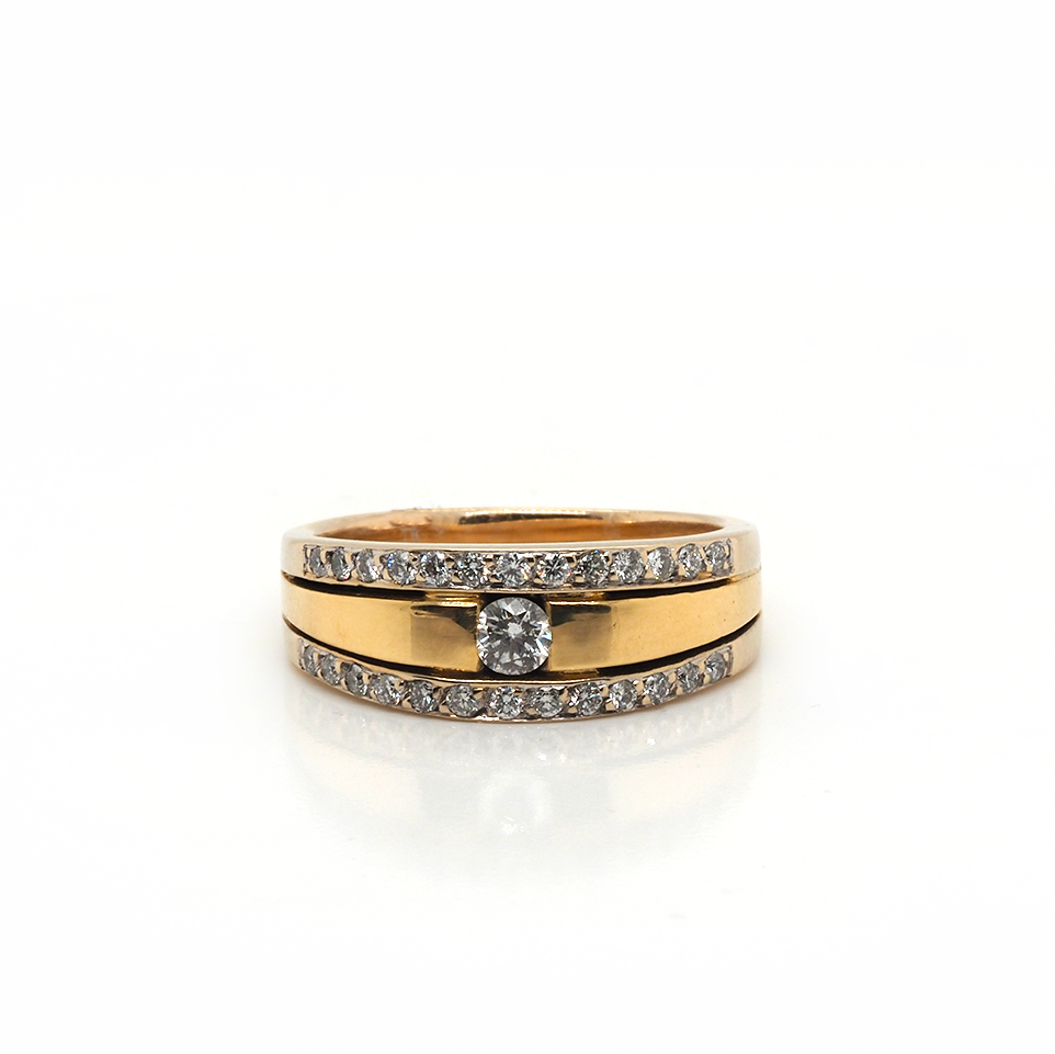 A yellow gold three row diamond band ring