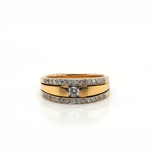 A yellow gold three row diamond band ring
