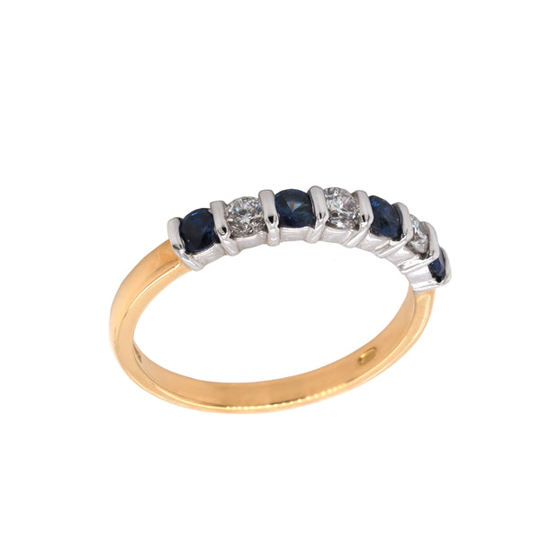 A round sapphire and diamond bar set half eternity ring in yellow and white gold