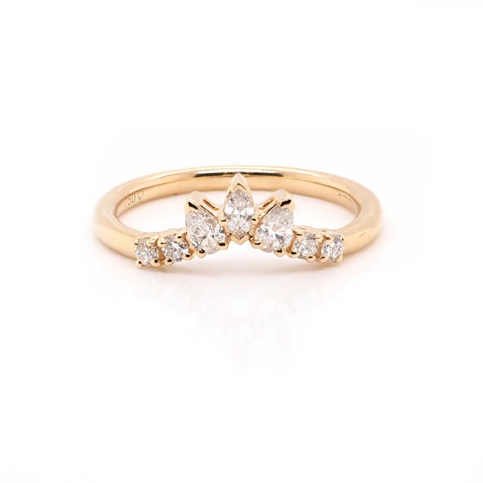 A yellow gold shaped diamond-set band