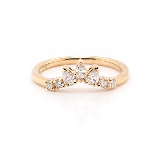 A yellow gold shaped diamond-set band
