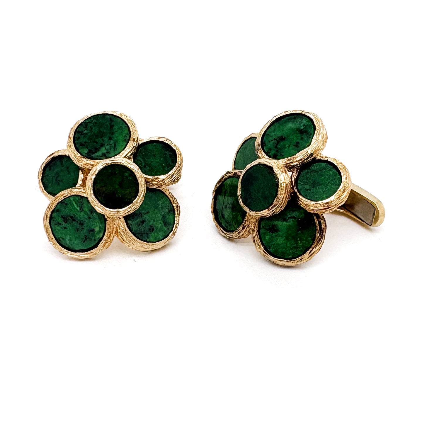 A pair of green hardstone cufflinks in yellow gold