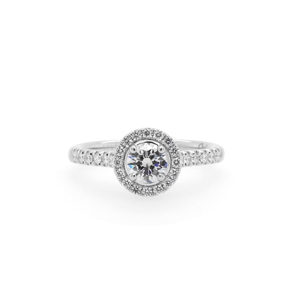 Jewellery A Platinum Brilliant-Cut Diamond Cluster Engagement Ring with Diamond Shoulders