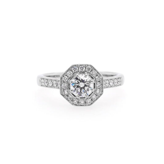 Jewellery A Platinum Brilliant-Cut Octagonal Diamond Cluster Ring with Diamond-Set Shoulders