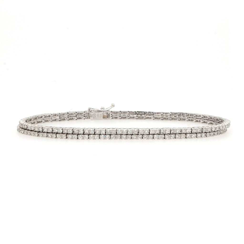 Jewellery An 18ct White Gold and Diamond Double Row Line Bracelet