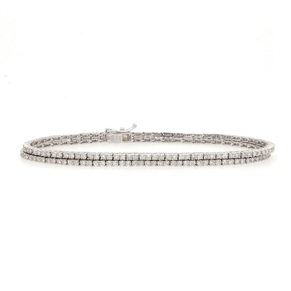 Jewellery An 18ct White Gold and Diamond Double Row Line Bracelet