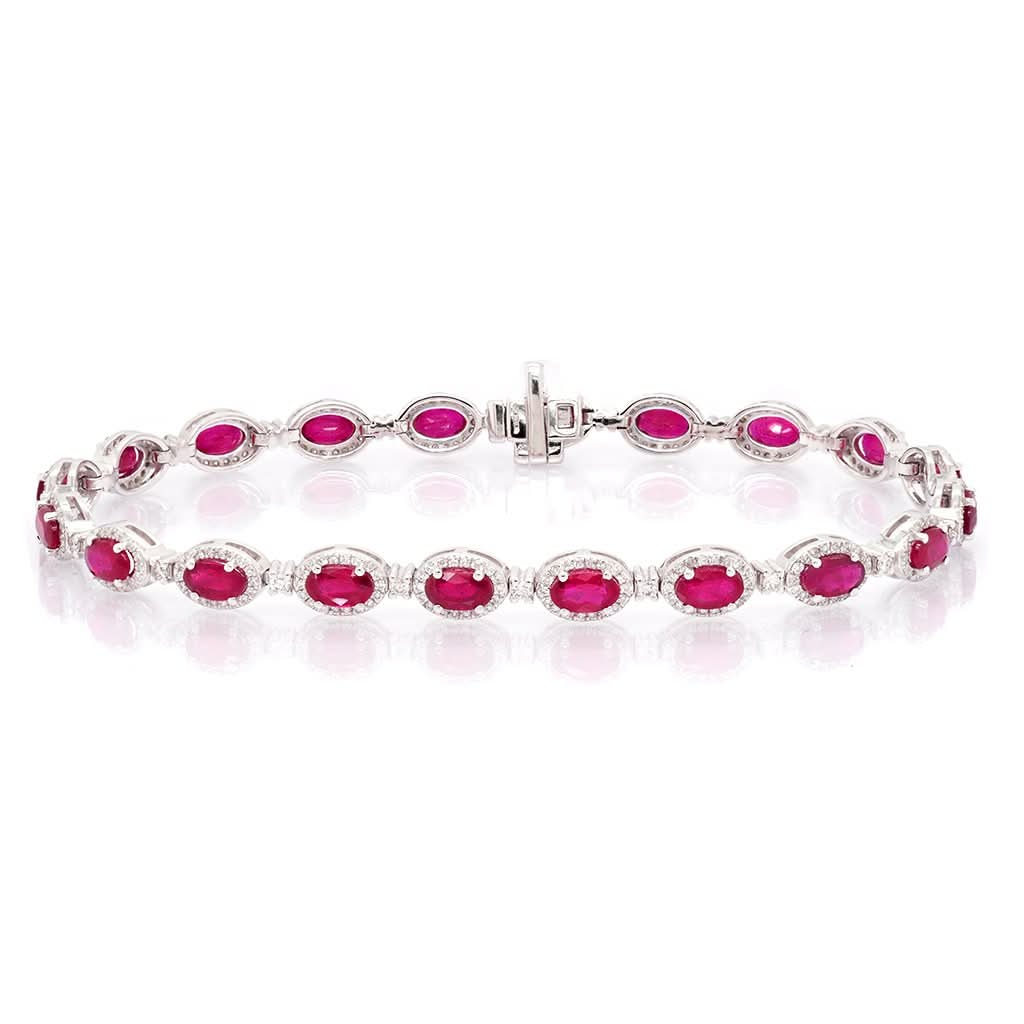 Jewellery An 18ct White Gold, Ruby and Diamond Cluster Bracelet