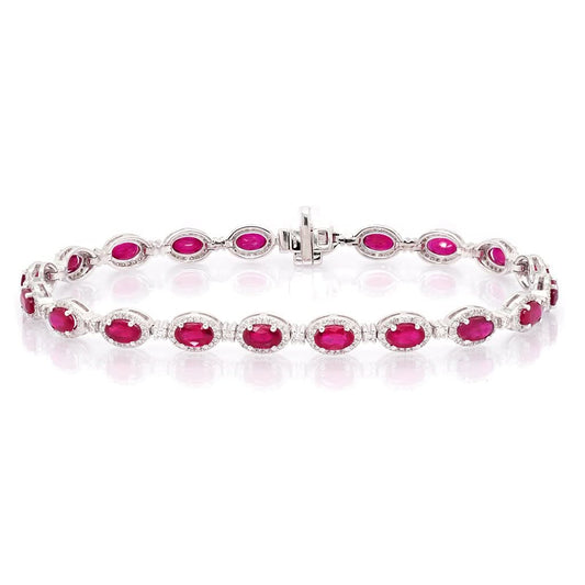 Jewellery An 18ct White Gold, Ruby and Diamond Cluster Bracelet