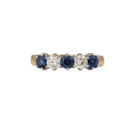 Jewellery An 18ct yellow and white gold, round sapphire and diamond, half eternity ring 1.20cts