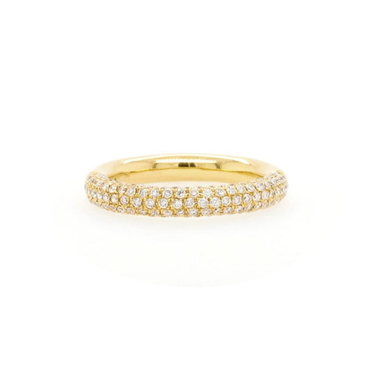 A yellow gold half eternity ring set with multiple rows of round diamonds