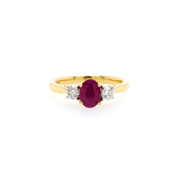 Jewellery An 18ct Yellow Gold Three-Stone Oval Ruby and Diamond Engagement Ring