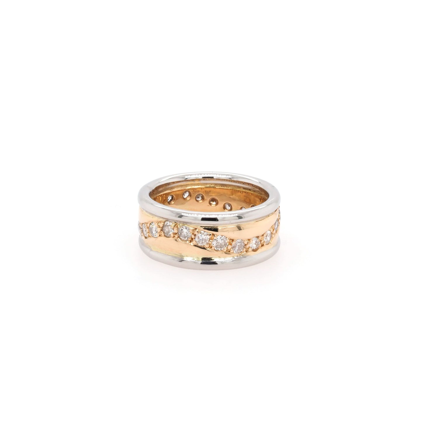 A yellow gold and platinum band with a wave of diamonds