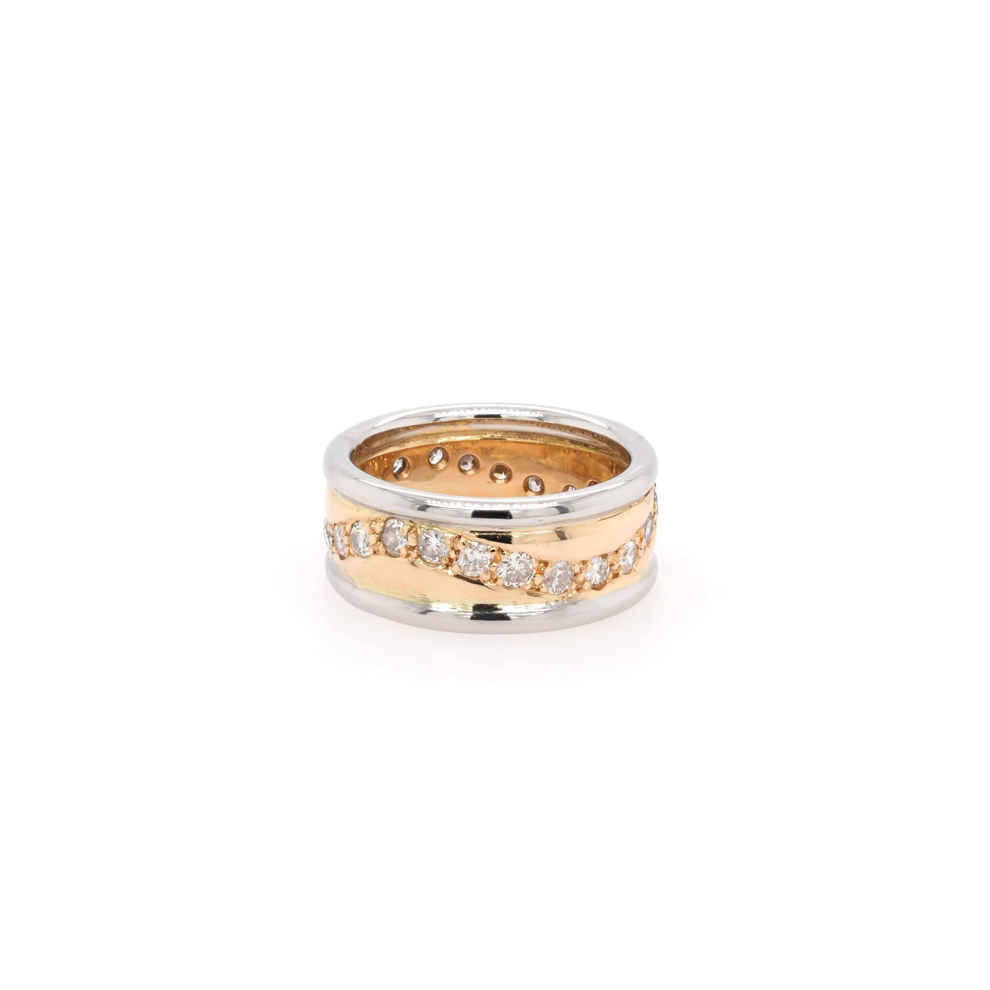 A yellow gold and platinum band with a wave of diamonds