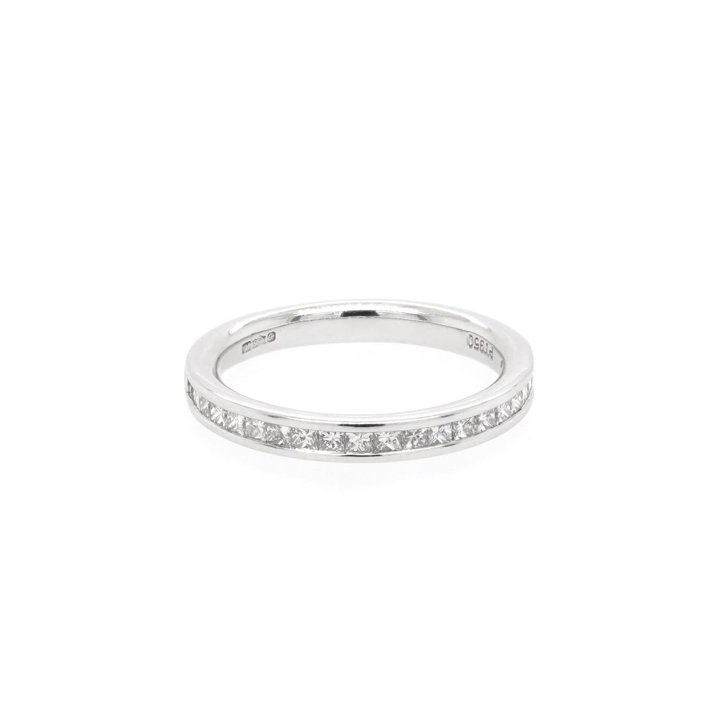 A platinum half eternity band channel set with princess cut diamonds