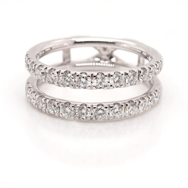 A diamond set two row full eternity ring with a space in between, mounted in platinum