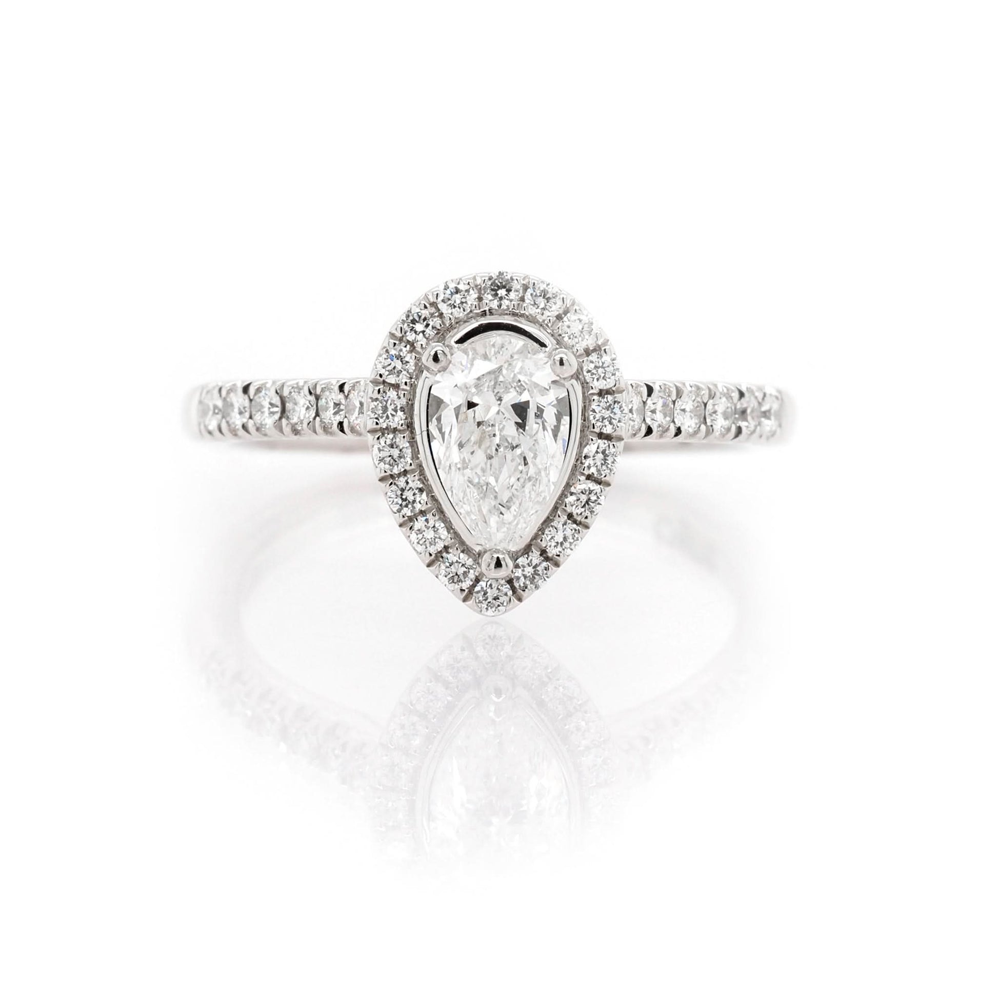 A pear and brilliant cut diamond cluster ring in platinum