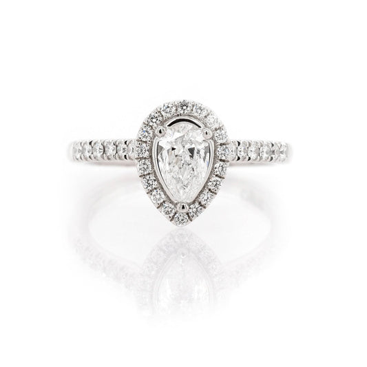 A pear and brilliant cut diamond cluster ring in platinum