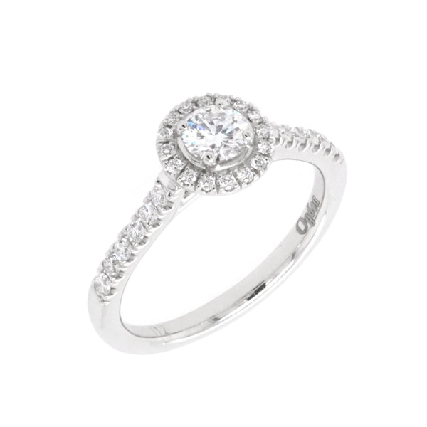 A brilliant cut diamond halo cluster ring in platinum with diamond set shoulders