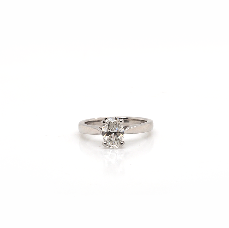 A single stone oval cut diamond engagement ring in platinum