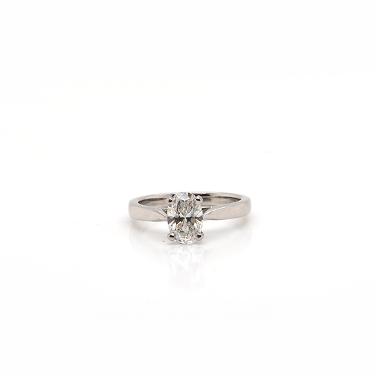 A single stone oval cut diamond engagement ring in platinum