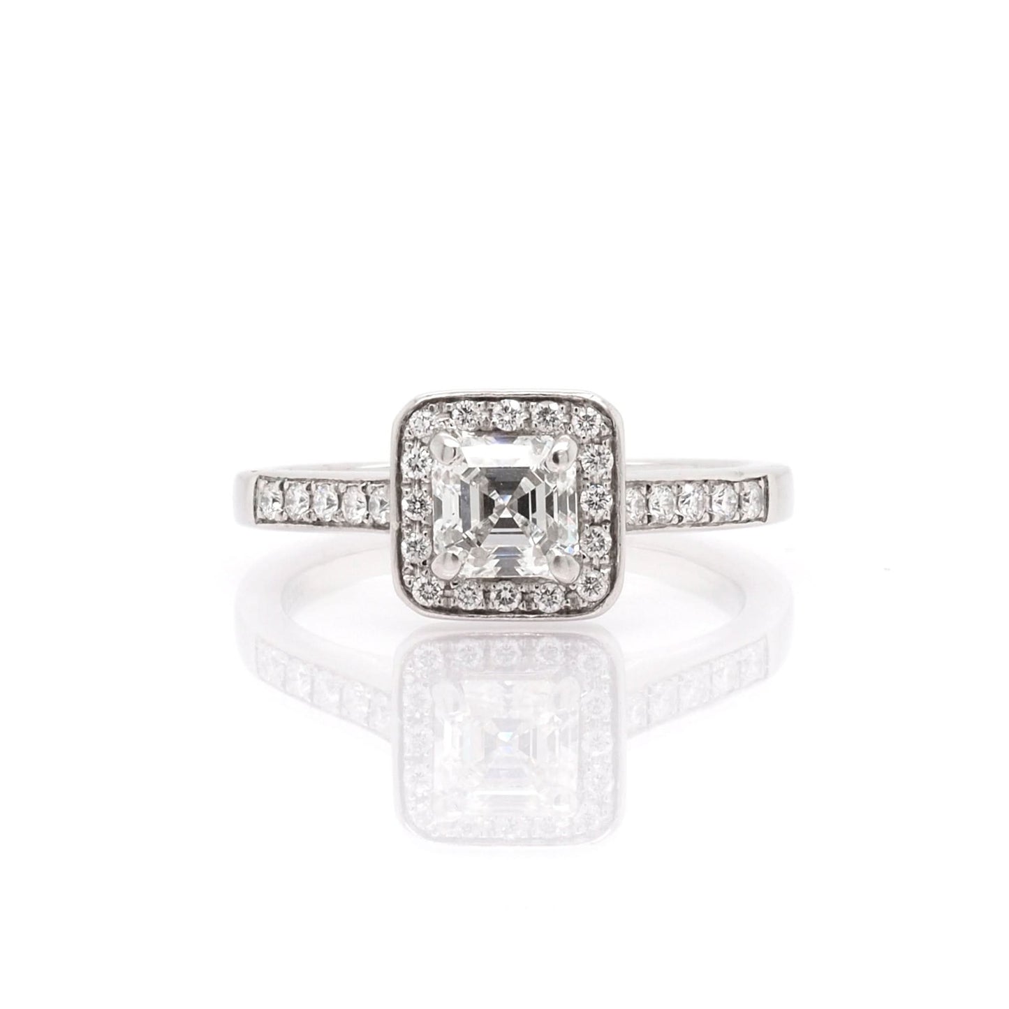 A platinum Square Diamond Cluster Ring with Diamond Set Shoulders