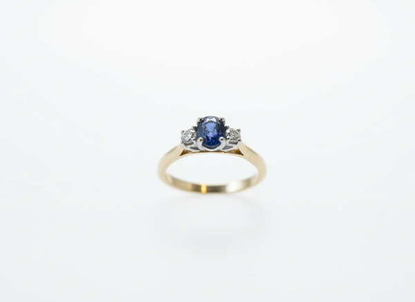 Sapphire And Diamond Three-Stone Engagement Ring In 18 ct Yellow Gold
