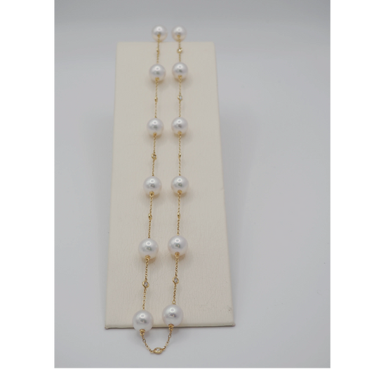 Single Row of Diamond and Akoya Pearl Necklace on a 18k Yellow Gold Chain