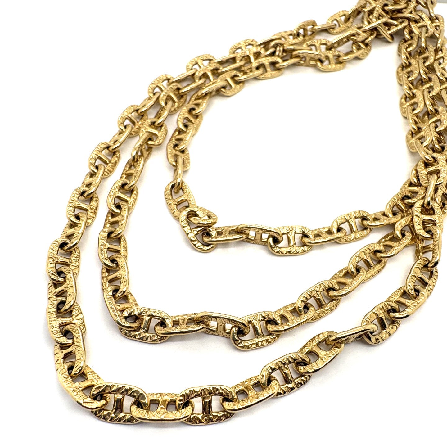 A yellow gold fancy anchor link chain necklace