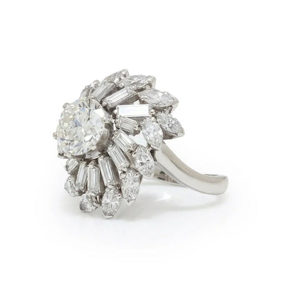 18 Carat White Gold Diamond Cluster Engagement Ring With 2.50 Carat Centre Diamond