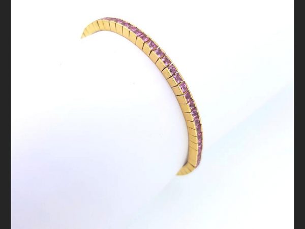 Pink Sapphire Line Bracelet; Princess cut pink sapphires set into 18ct yellow gold line bracelet, 17.7g. Total pink sapphire weight: 5.00 carats
