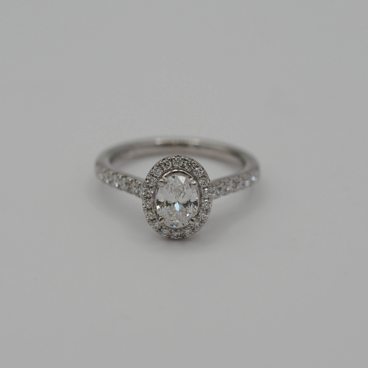 Jewellery Platinum Oval Diamond Cluster Ring 0.71ct oval diamond, F colour, SI1 clarity