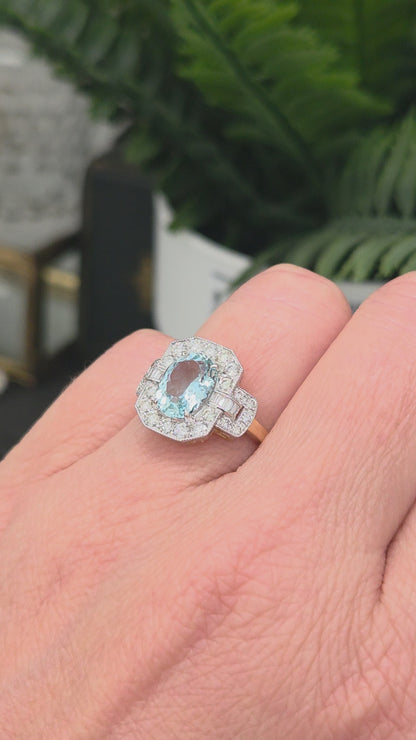 1.64ct Oval Aquamarine and Diamond Cluster Dress Ring with Buckle Shoulders