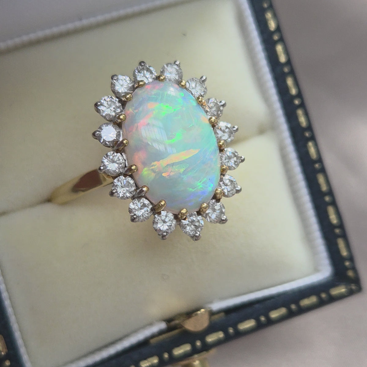 Vintage Oval Cabochon Opal and Diamond Cluster Ring