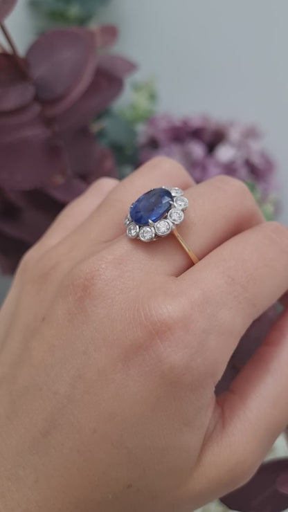 4.62ct Oval Sapphire and Diamond Cluster Engagement Ring