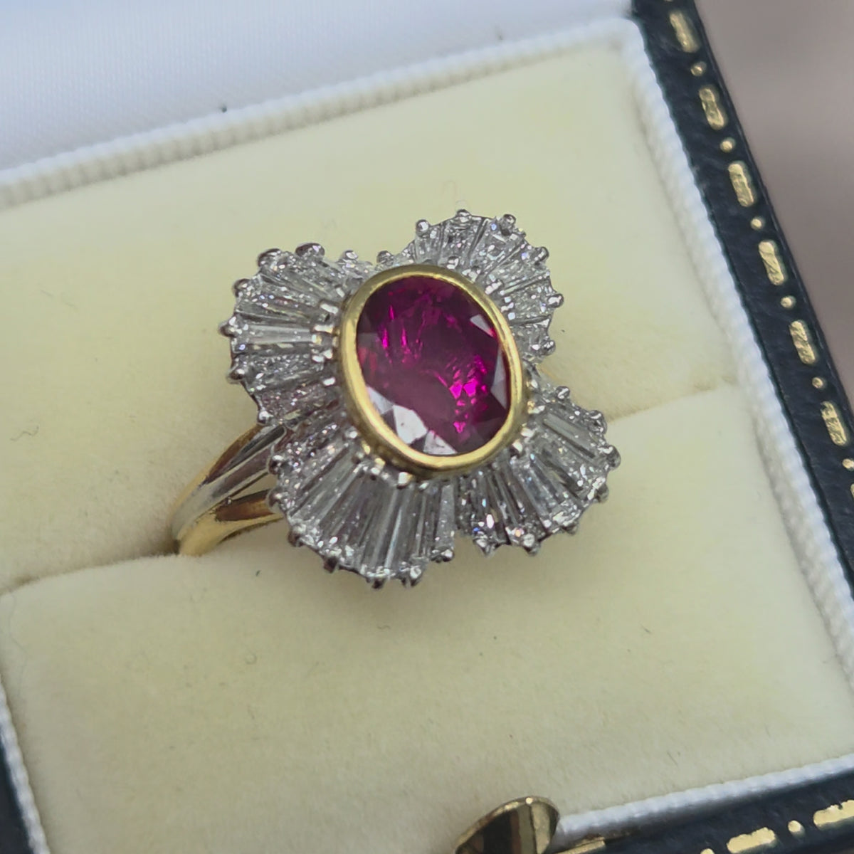 Oval Ruby and Tapered Baguette Diamond Ballerina Cluster Ring