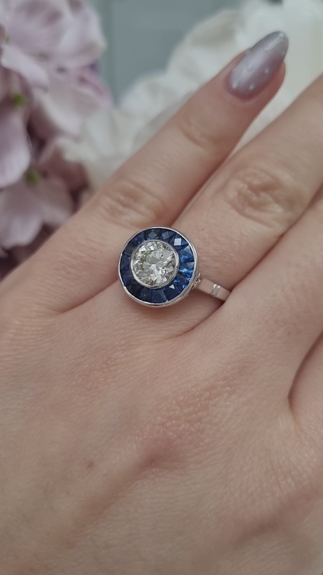1.21ct Diamond and Calibre Sapphire Target Engagement Ring