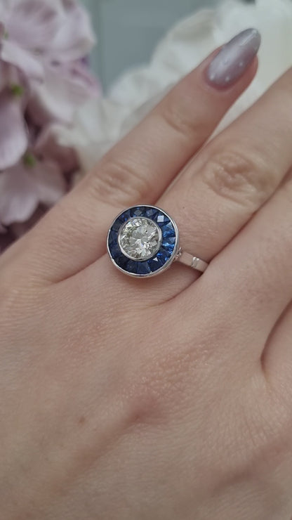 1.21ct Diamond and Calibre Sapphire Target Engagement Ring