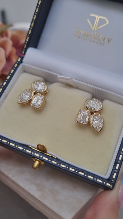 Stylish Pear Oval and Emerald Cut Diamond Earrings
