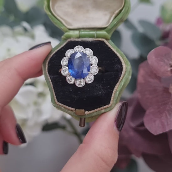4.62ct Oval Sapphire and Diamond Cluster Engagement Ring