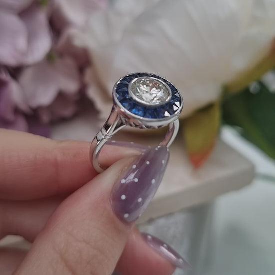 1.21ct Diamond and Calibre Sapphire Target Engagement Ring