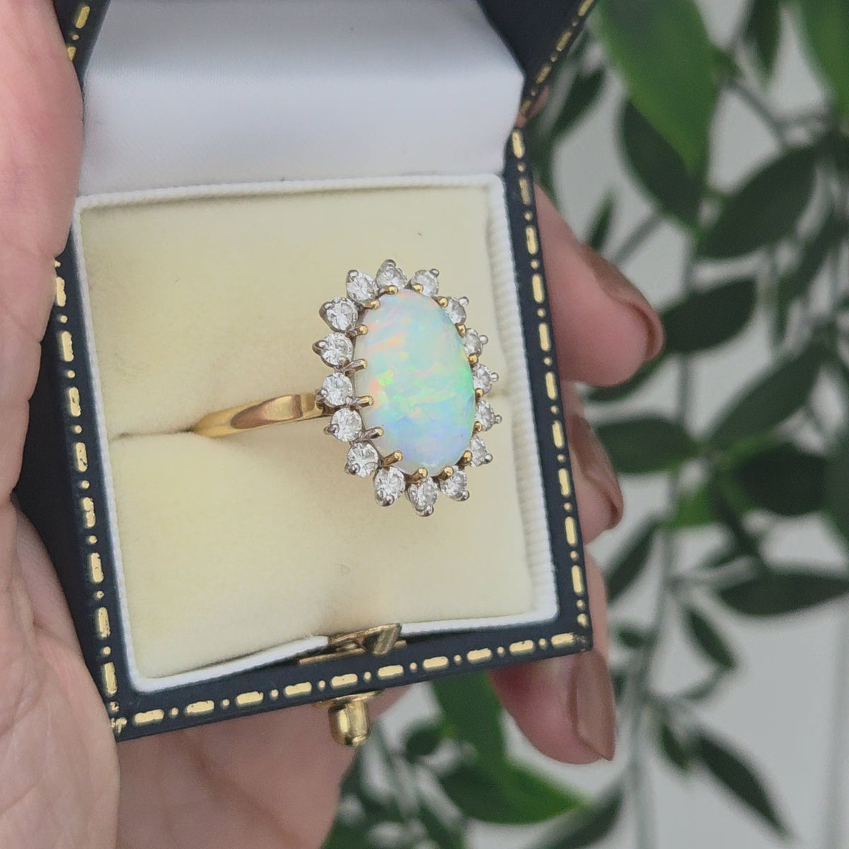 Vintage Oval Cabochon Opal and Diamond Cluster Ring