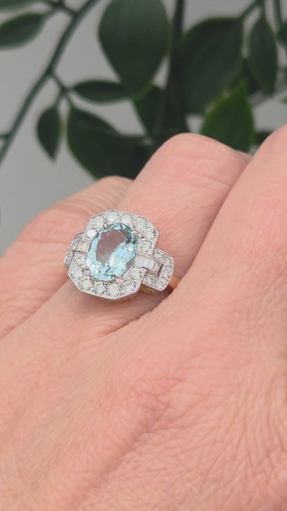 1.64ct Oval Aquamarine and Diamond Cluster Dress Ring with Buckle Shoulders