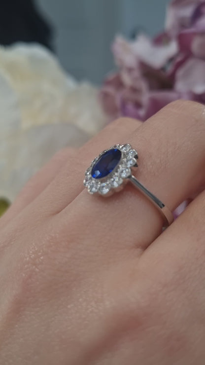 1.33ct Oval Sapphire and Diamond Cluster Engagement Ring