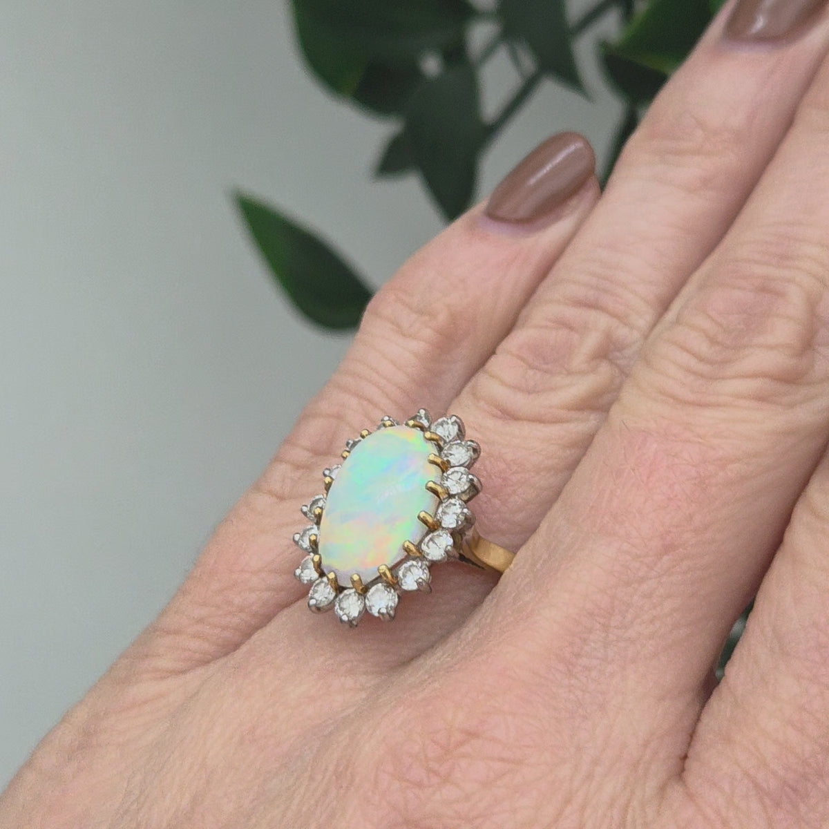 Vintage Oval Cabochon Opal and Diamond Cluster Ring
