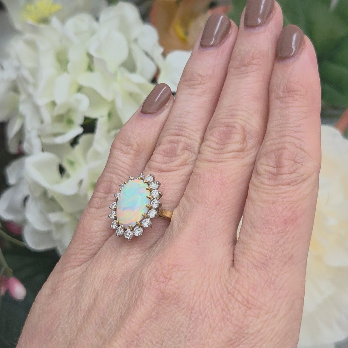 Vintage Oval Cabochon Opal and Diamond Cluster Ring